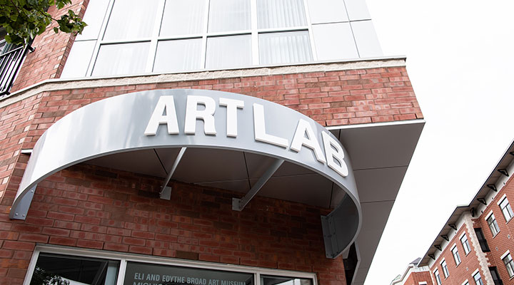 Photo of a building with a sign that reads "Art Lab"